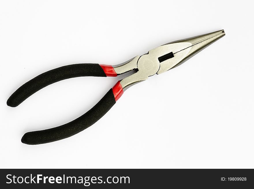 Closeup of long nose pliers - studio isolated on white