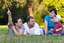 Grandpa, Daughters And Niece On Grass Royalty Free Stock Photos Grandpa, Daughters And Niece On Grass Royalty Free Stock Photos