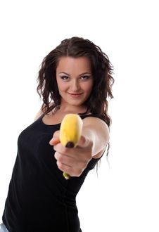 Young Woman Shoot With Banana Gun Stock Photography Young Woman Shoot With Banana Gun Stock Photography