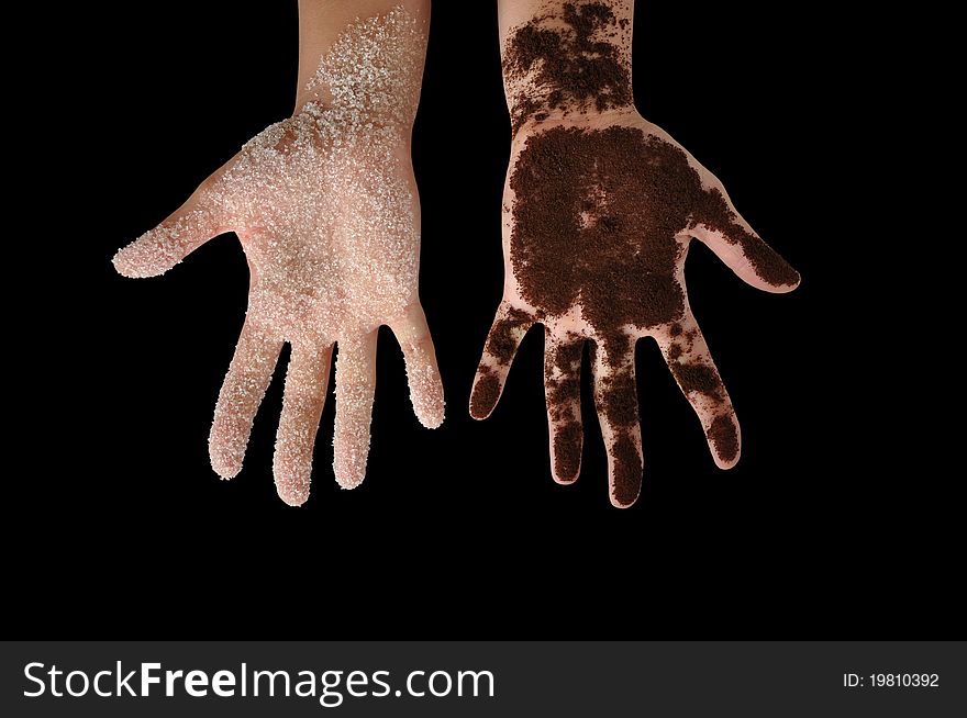Coffee and sugar on hands isolated on black. Coffee and sugar on hands isolated on black