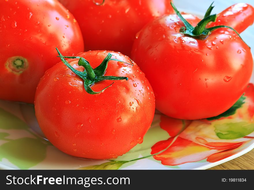 Fresh, red tomatoes for a plate