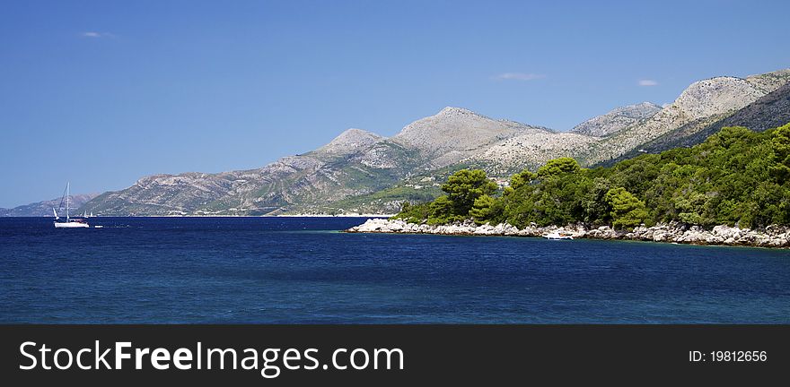One of the Elafiti islands off shore Dubrovnik and the croatian coast in a great summer weather. One of the Elafiti islands off shore Dubrovnik and the croatian coast in a great summer weather.