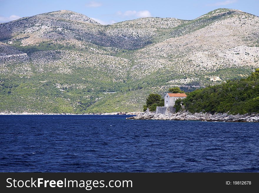 One of the Elafiti islands off shore Dubrovnik and the croatian coast in a great summer weather. One of the Elafiti islands off shore Dubrovnik and the croatian coast in a great summer weather.