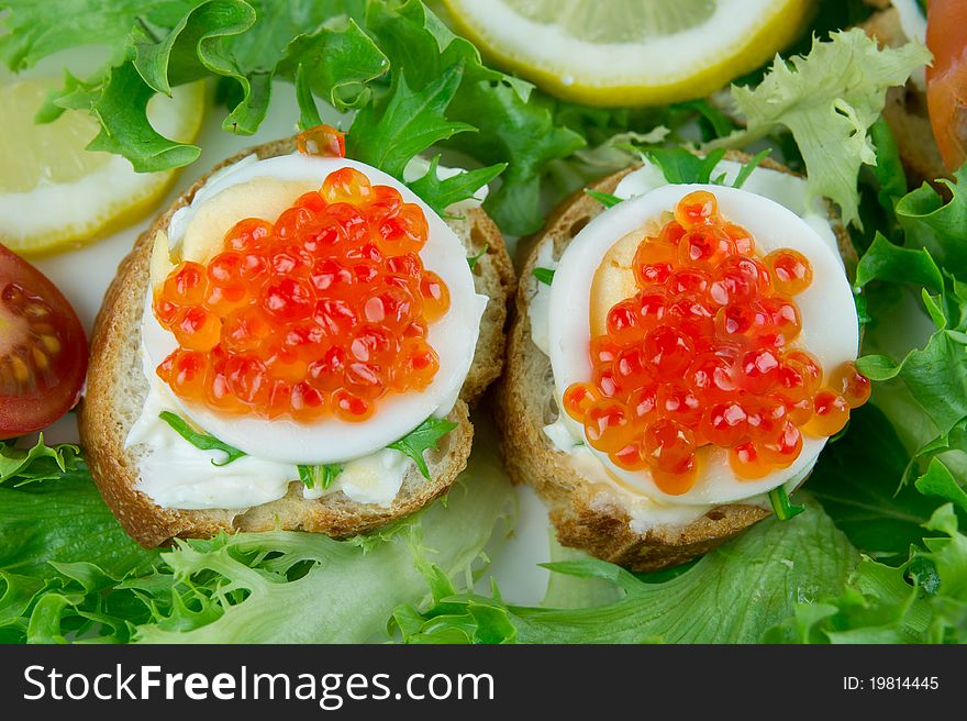 Canapes with a red caviar. Canapes with a red caviar