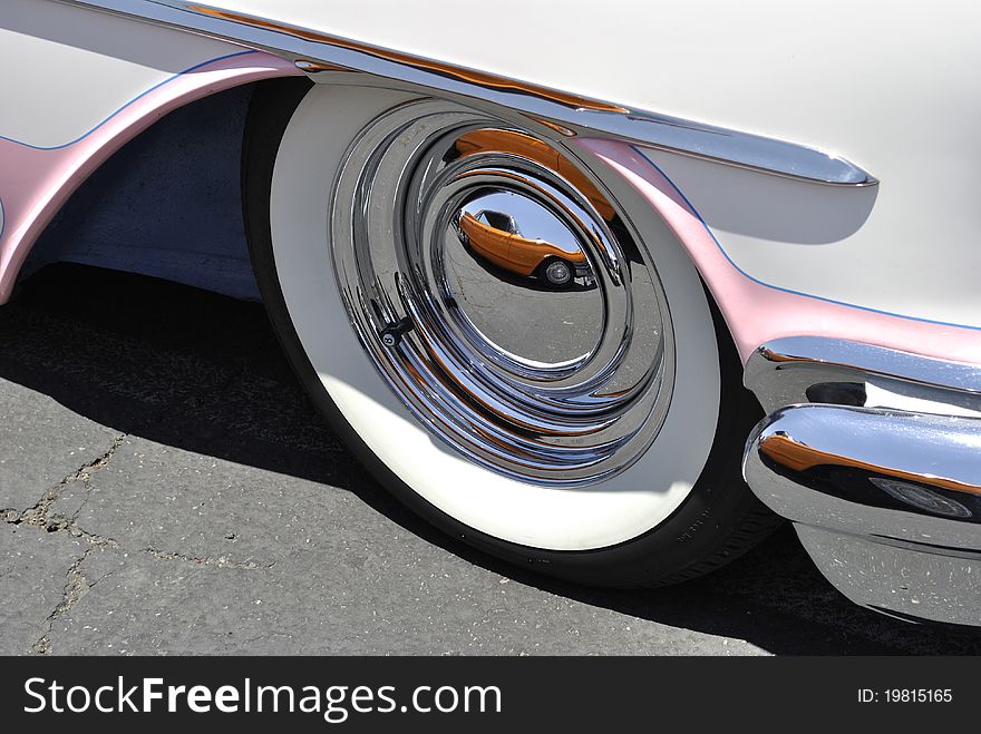 Reflection off a classic car wheel. Reflection off a classic car wheel.