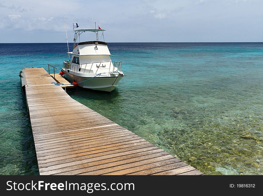 Diving boat at a pontoon in Curacao. Diving boat at a pontoon in Curacao
