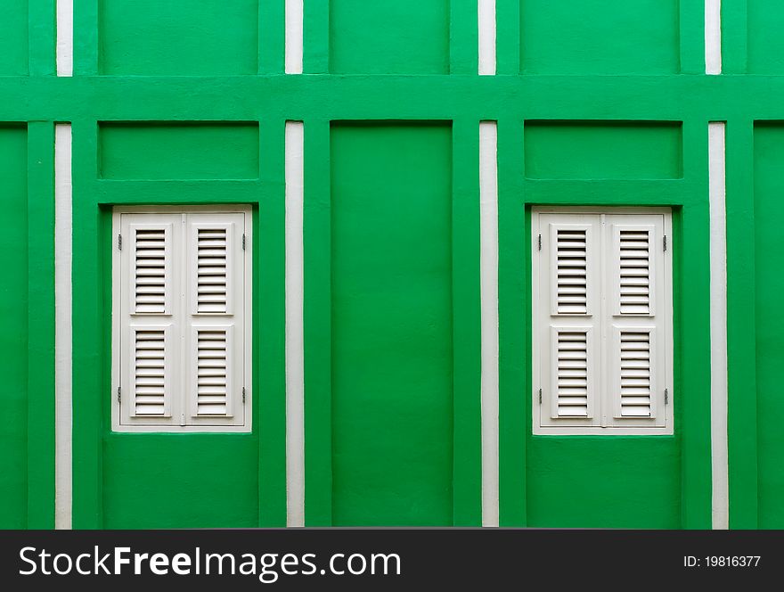 Detail of a bright green house