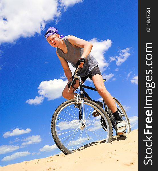 Young Men  Riding A Bike