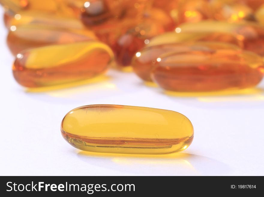 Yellow Pills Vitamin Soft Gels - fish oil. Yellow Pills Vitamin Soft Gels - fish oil