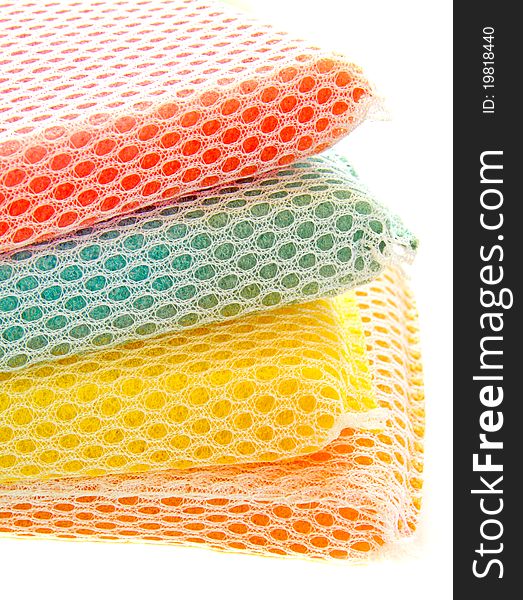 Stack of colorful sponges isolated on white background. Stack of colorful sponges isolated on white background