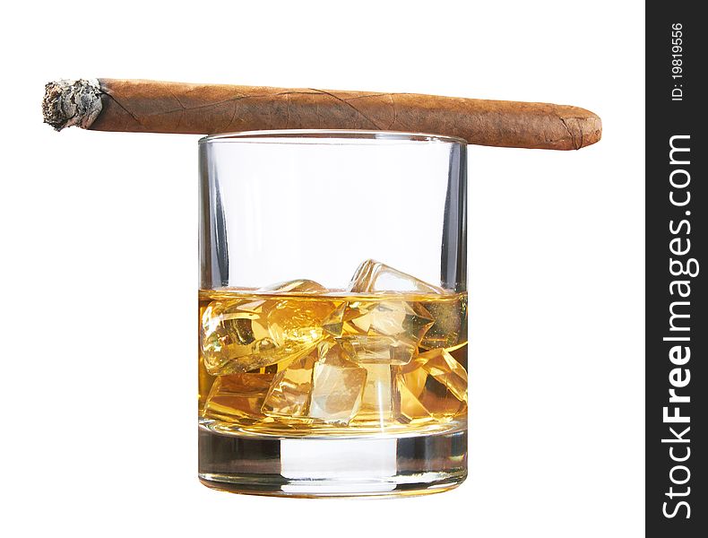 Whiskey with ice and cigar, isolated on white