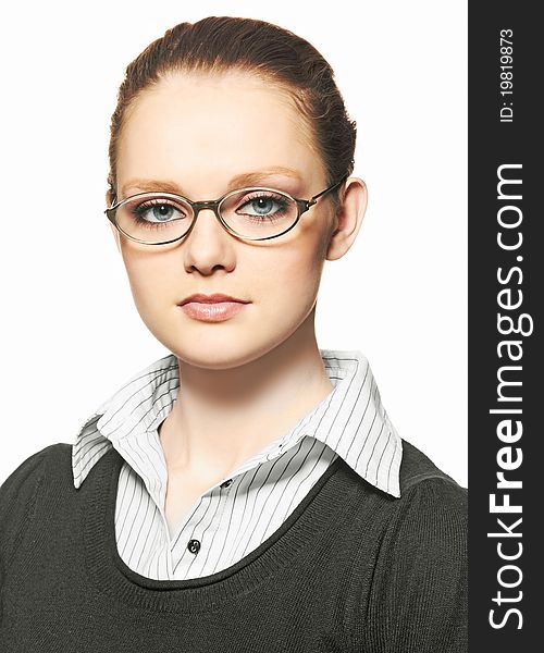 Young beautiful woman in glasses on white background