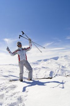 Beautiful Skier On The Top Of Mountain Royalty Free Stock Photos