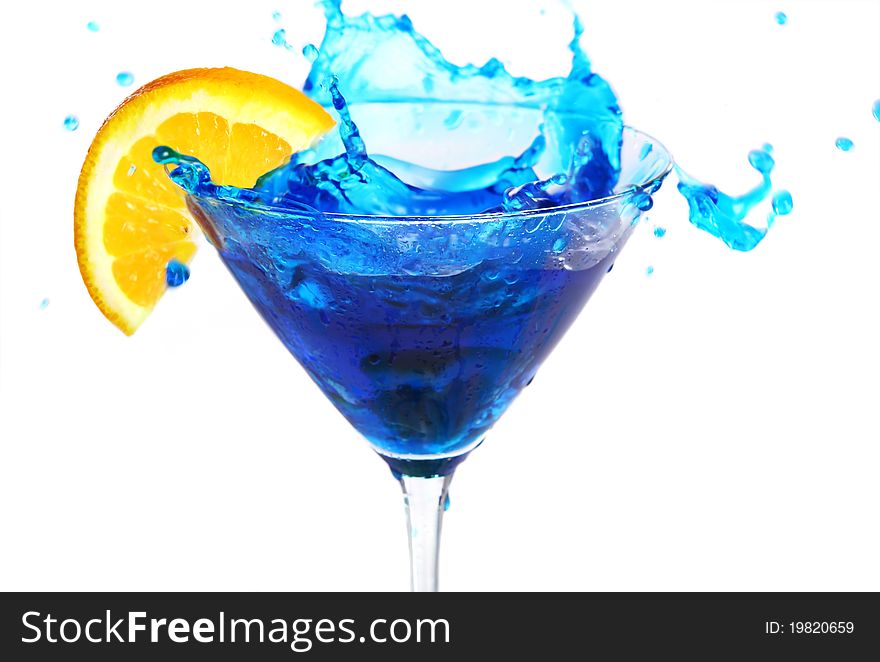 Blue cocktail with orange isolated on white