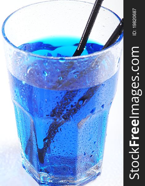 Wet Glass with blue cocktail
