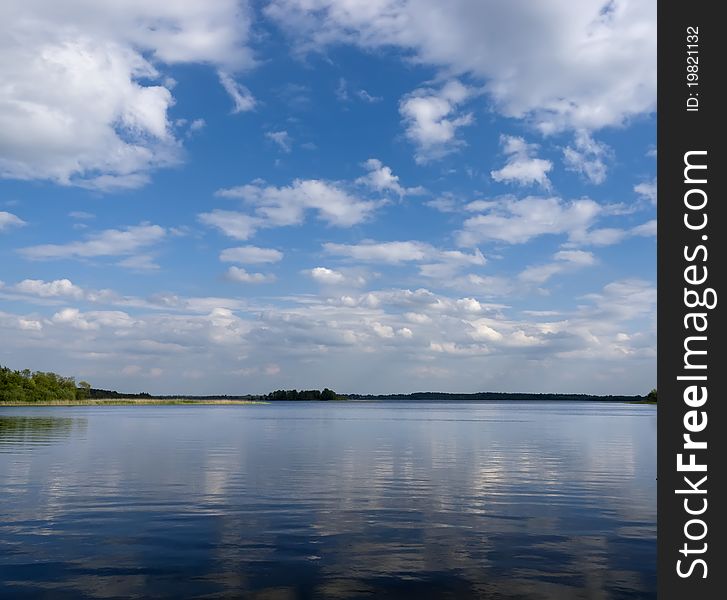 View the beautiful river in the summer, cloudy