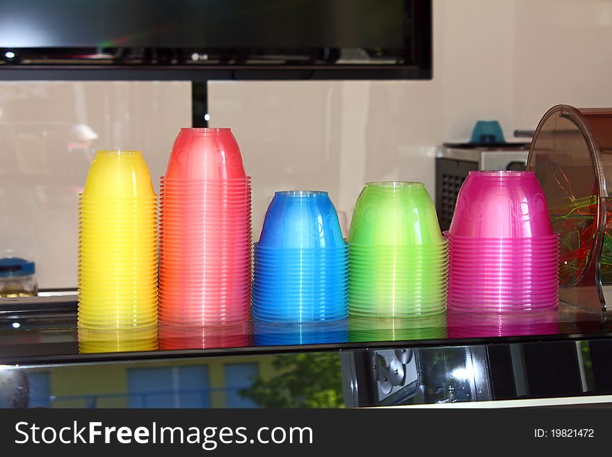 Plastic ice-cream cups in different colours. Plastic ice-cream cups in different colours
