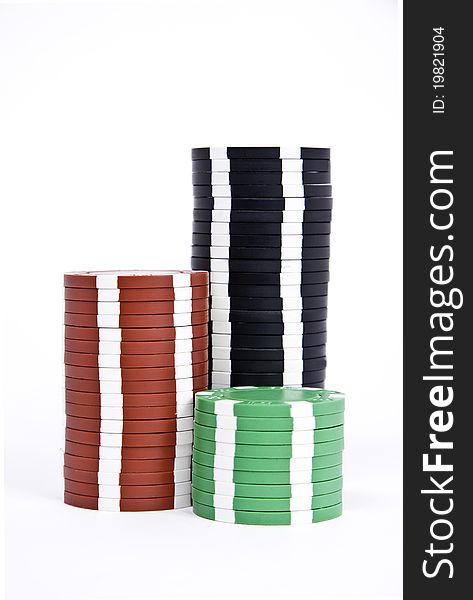 Black red and green gambling chips isolated on white. Black red and green gambling chips isolated on white