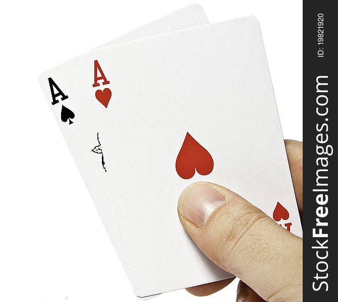A pair of aces with a hand isolated on white