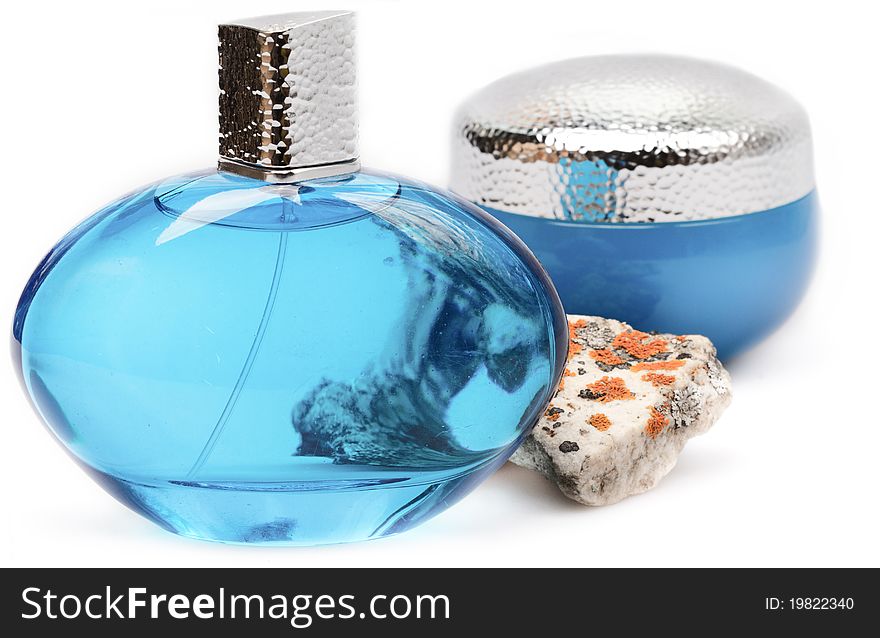 Two perfume bottle over white