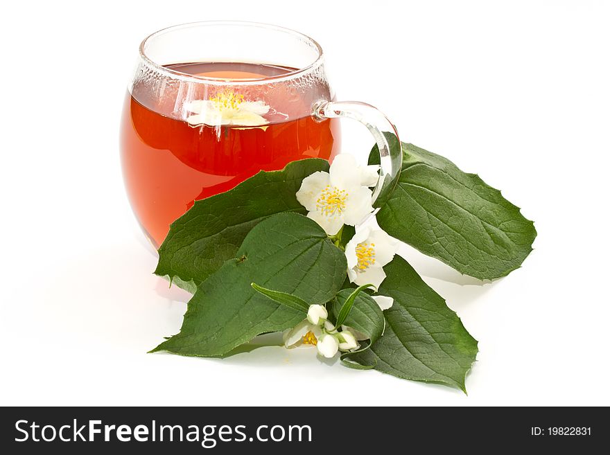 Jasmine tea and jasmine flowers on a white background