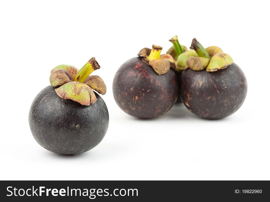 Mangosteen (Thai queen of fruit) in shallow depth of field. Mangosteen (Thai queen of fruit) in shallow depth of field