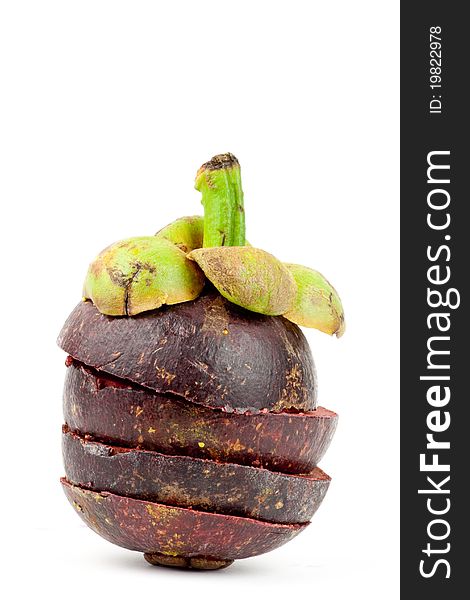 Stack of cut mangosteen in white background