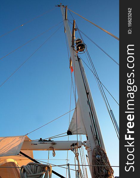 View of a sailing boat's must under the Greek blue sky