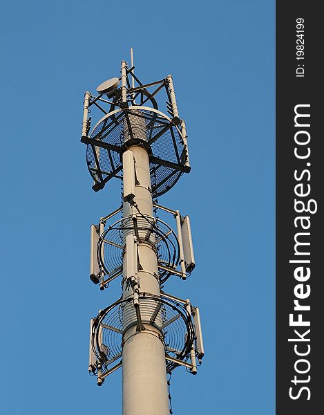 Of mobile telephone relay tower against the sky