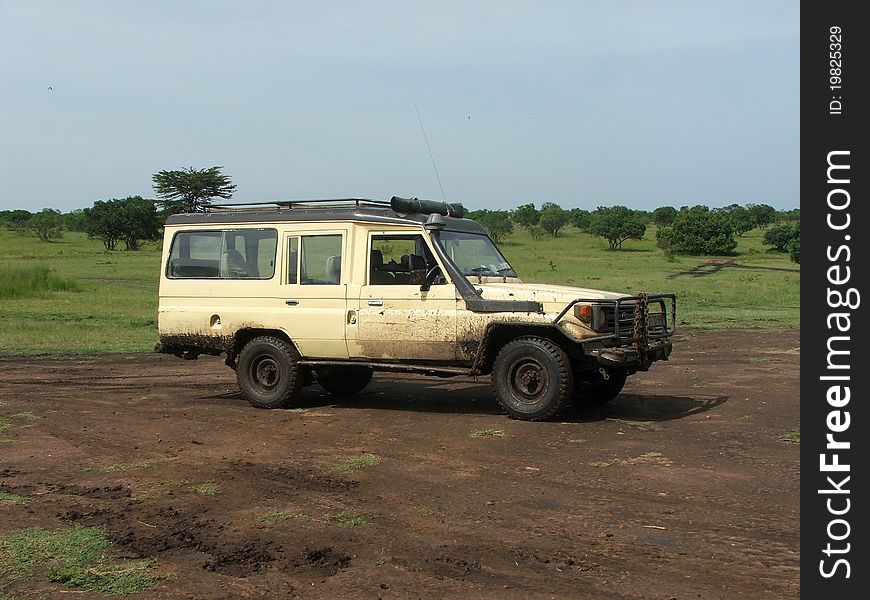 Empty safari vehicle on the plains of the Masai Mara