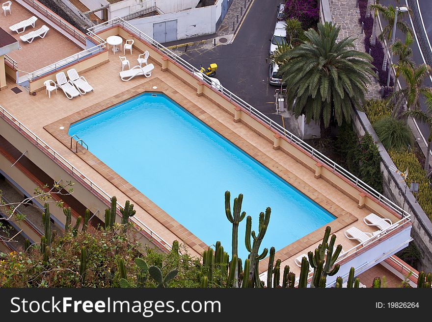 Swimming pool on top of a resort. Swimming pool on top of a resort