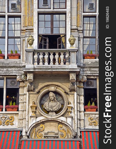 Balcony with a statue and vases. Brussels. Fragment.