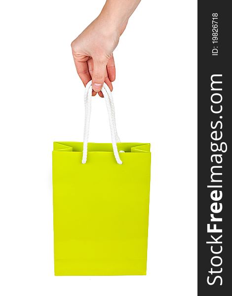 Hand with green bag