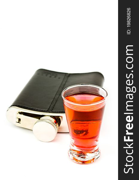 Flask and vodka isolated on white background