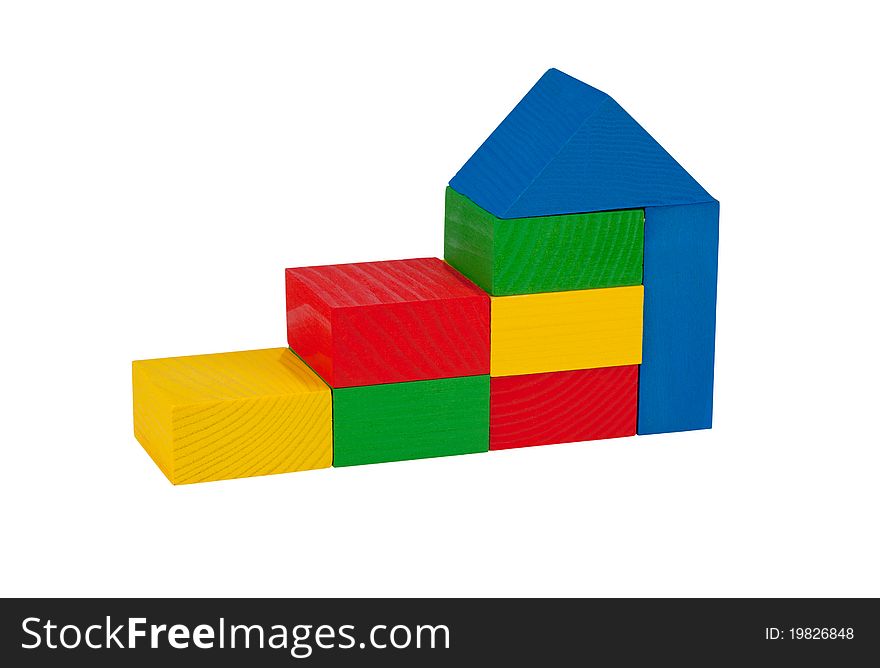 The construction of children's wooden blocks, isolated on a white background. The construction of children's wooden blocks, isolated on a white background.