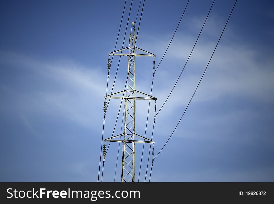 Tower of high tension on blue sky. Tower of high tension on blue sky.