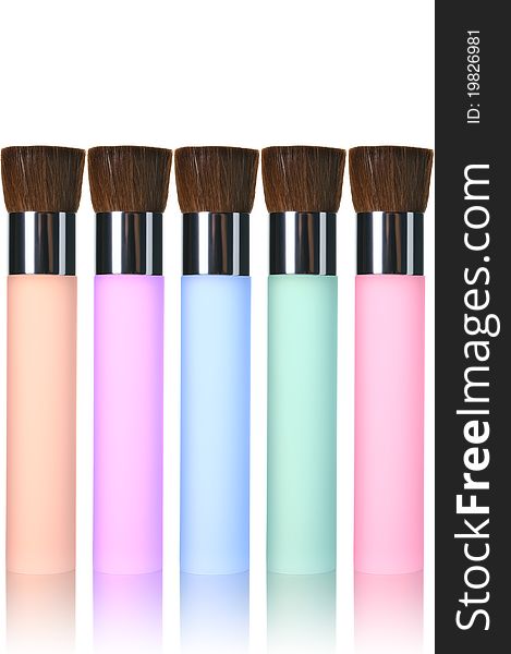 Multicolor makeup brushes isolated on white