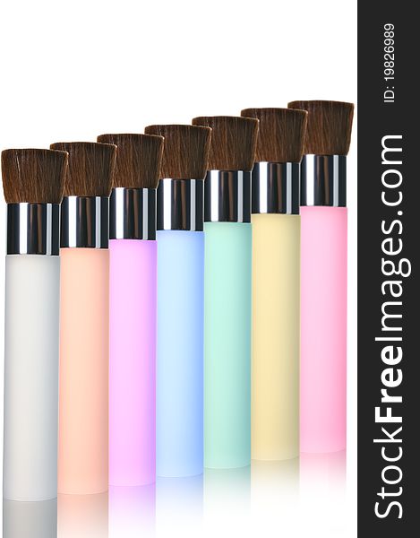 Multicolor makeup brushes isolated on white