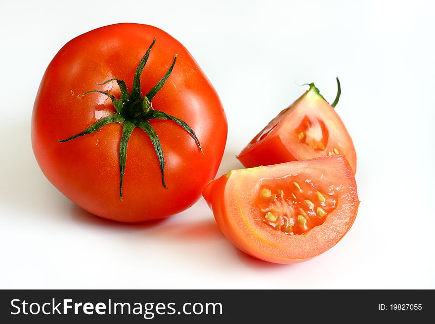 Isolated tomato on a white background. Isolated tomato on a white background