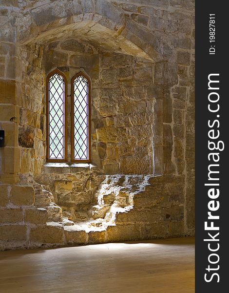 Abbey leaded glass windows in limestone walls. Abbey leaded glass windows in limestone walls