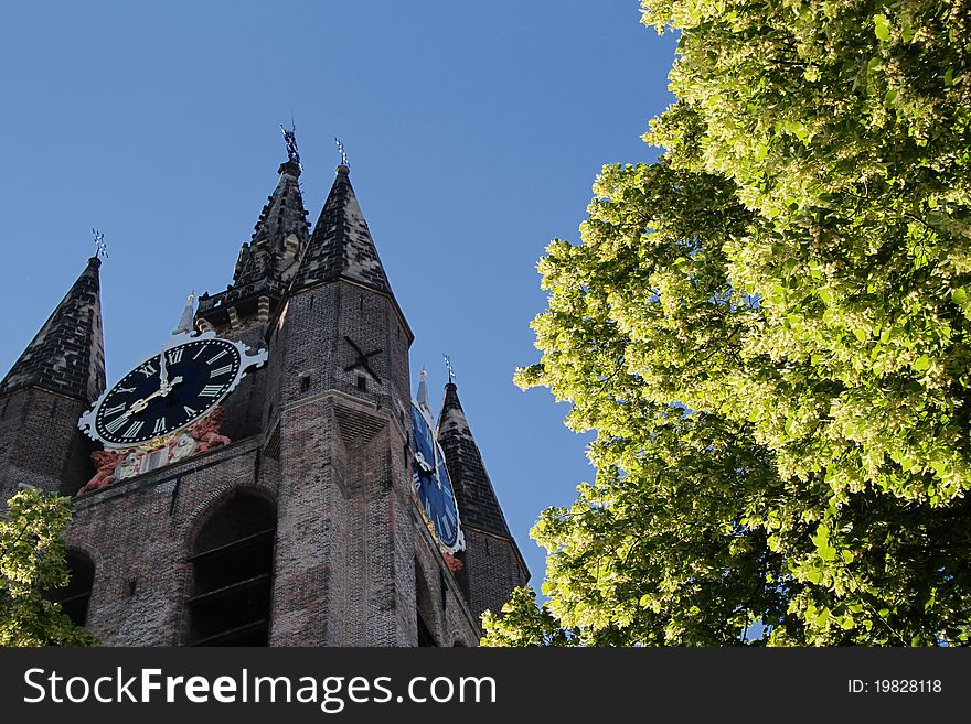 It shows the tower of the Old Churck of the city of Delft in the Netherlands. It shows the tower of the Old Churck of the city of Delft in the Netherlands