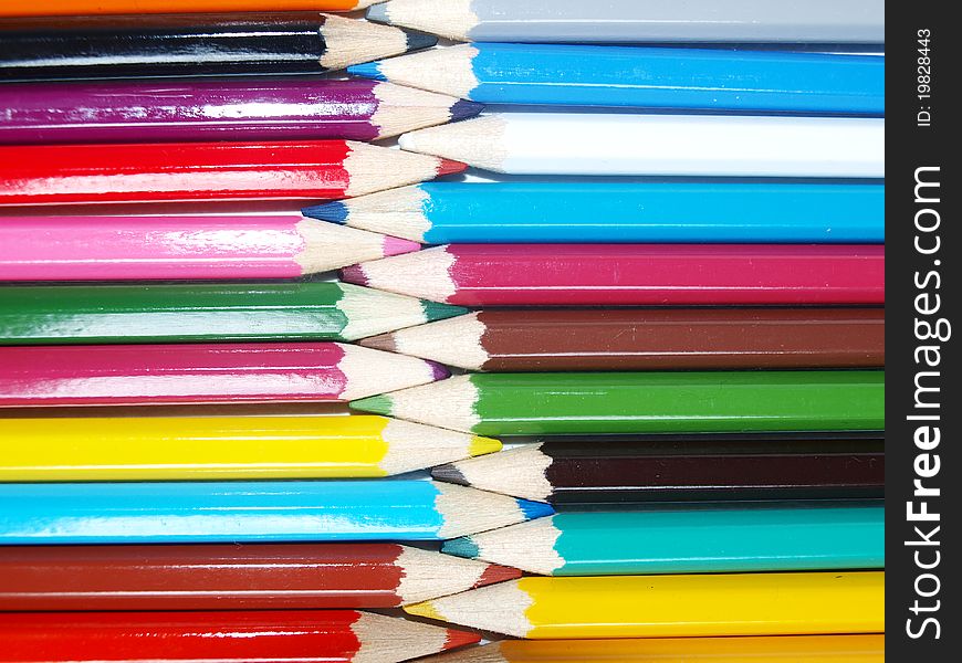 Colorful crayons on a background