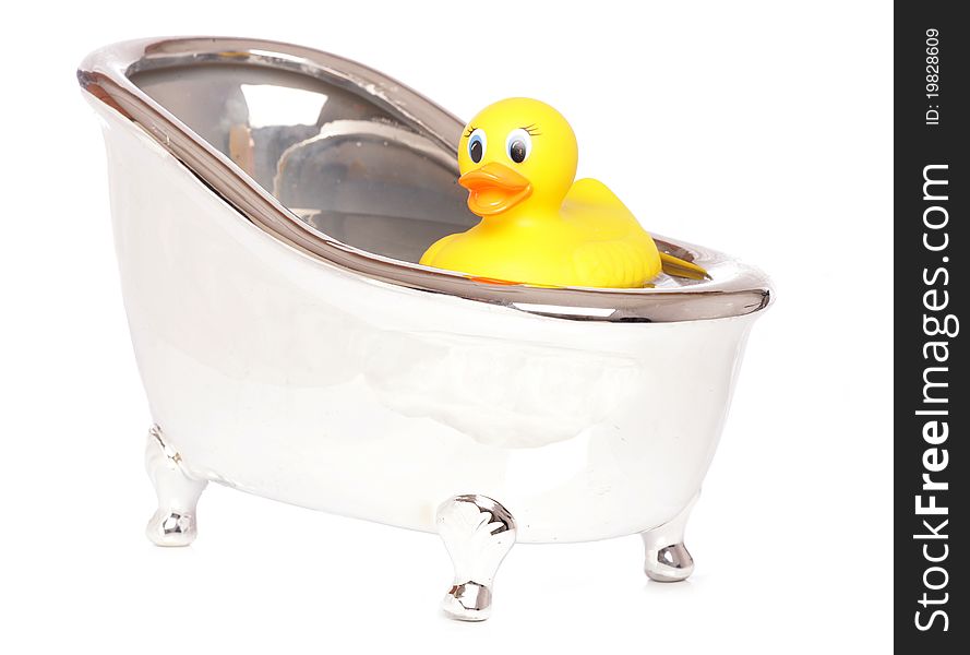 Yellow rubber duck in a bath studio cutout