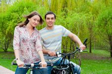 Happy Young Couple Riding Bicycles Royalty Free Stock Images Happy Young Couple Riding Bicycles Royalty Free Stock Images