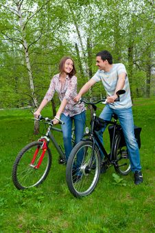 Happy Young Couple Riding Bicycles Royalty Free Stock Photos Happy Young Couple Riding Bicycles Royalty Free Stock Photos