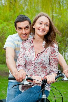 Happy Young Couple Riding Bicycles Stock Images Happy Young Couple Riding Bicycles Stock Images