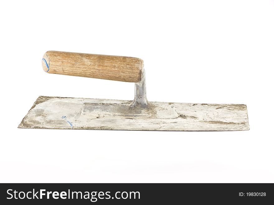 Old dirty trowel isolated on white background