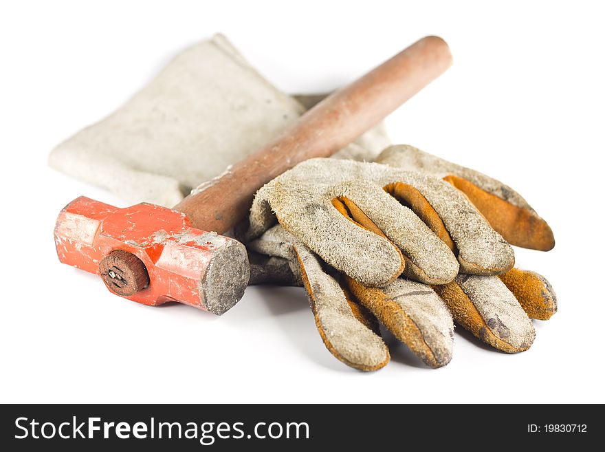 Dirty old leather gloves  shallow focus isolated on white background. Dirty old leather gloves  shallow focus isolated on white background