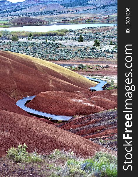 A boardwalk leads through a section of painted hills in Oregon. A boardwalk leads through a section of painted hills in Oregon.