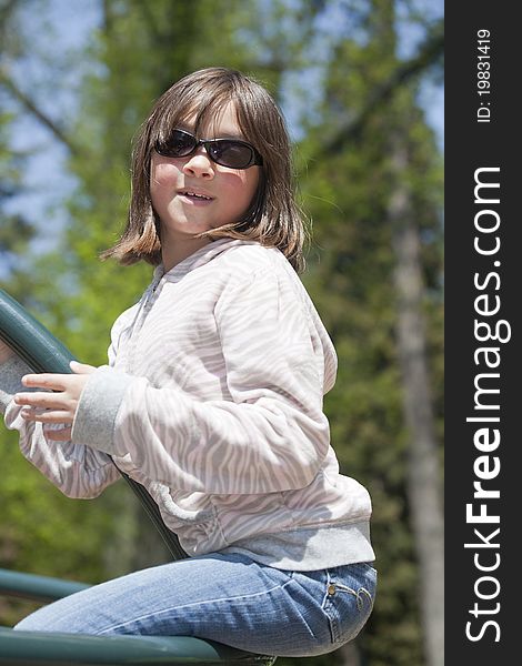 Girl On Playground Ride.